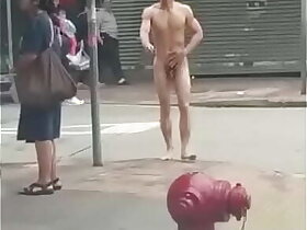 nude guy walking upon public