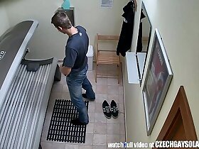 Young man secretly filmed round public solarium