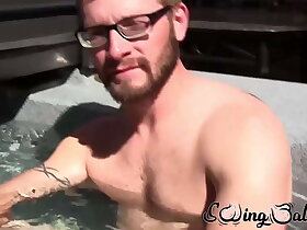 Gay with glasses shows balls before masturbating with buddy